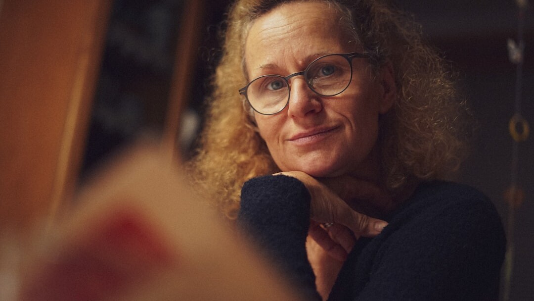 mature woman reading book