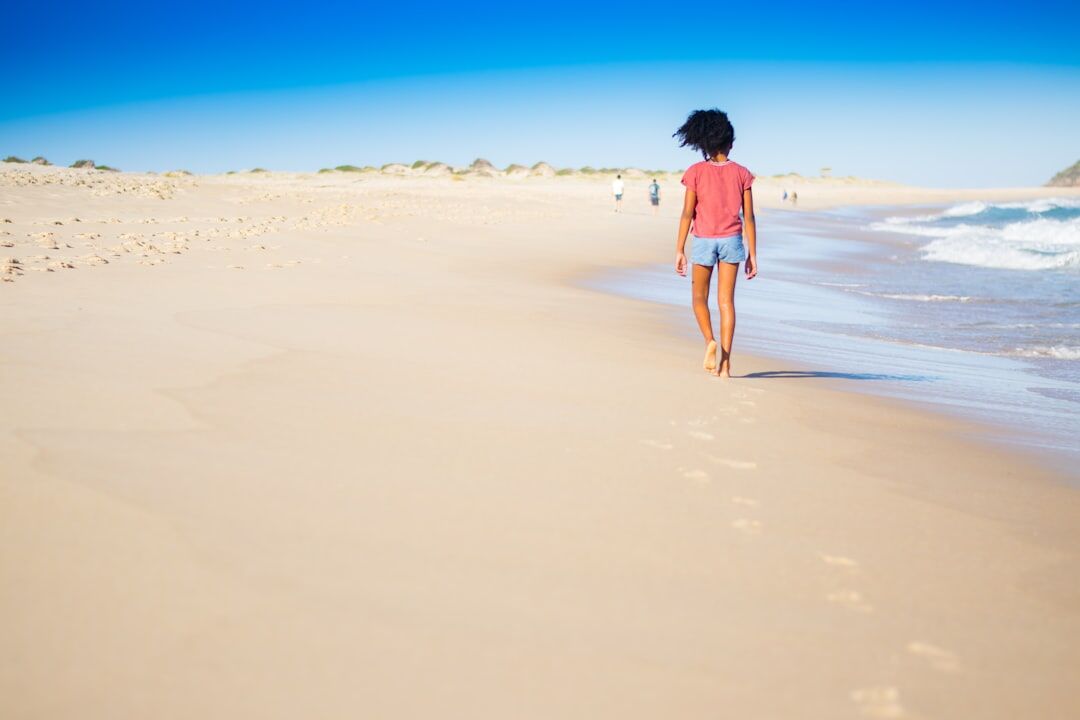 woman walking on beach